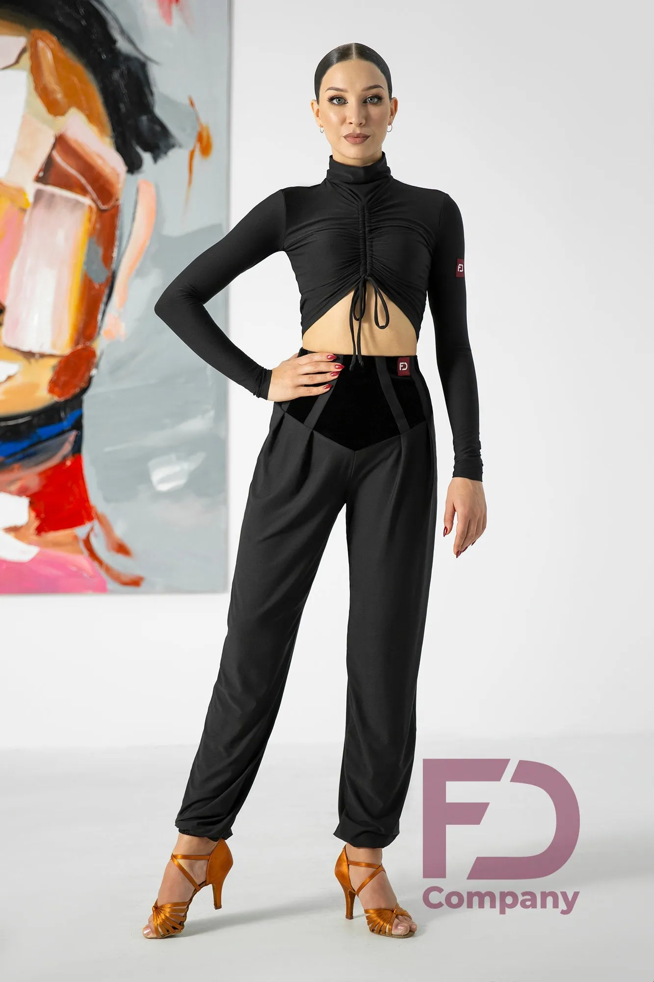 Tapered black trousers for dancing. Women's tango trousers with velor inserts on the yoke